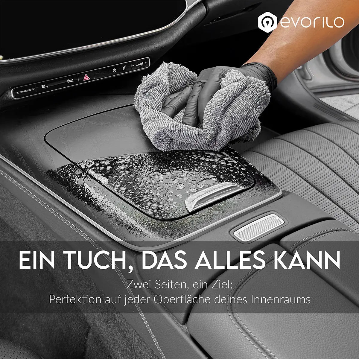 evorilo Hybrid Wipe Autotuch reinigt Armaturenbrett, zeigt Hand in schwarzem Handschuh in Aktion, ideal für Innenraumreinigung.