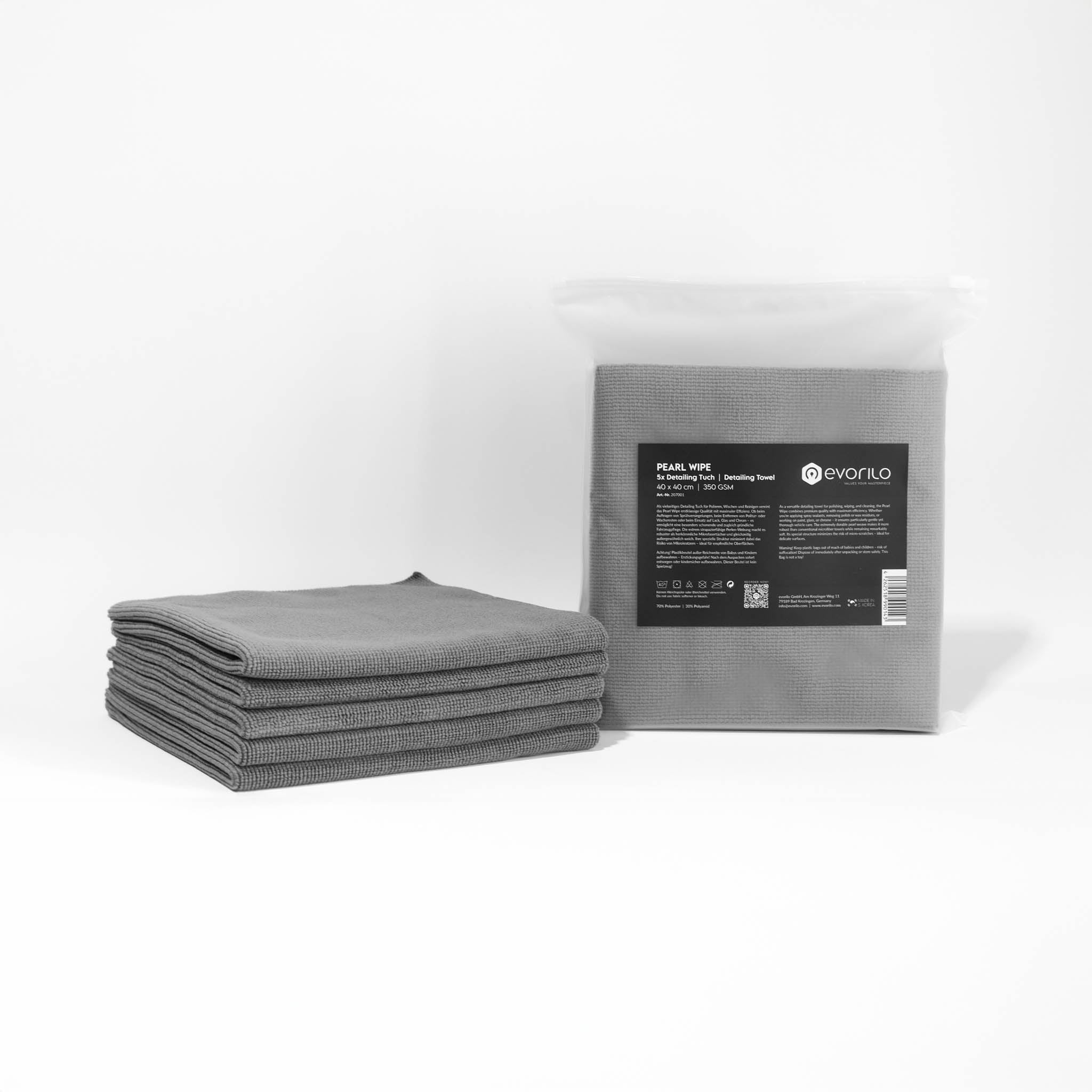 Stapel grauer evorilo Pearl Wipe Detailing Tücher 350 GSM für Autopflege neben Verpackung.